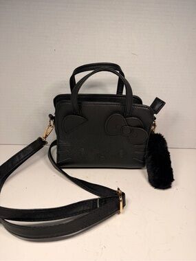 Sanrio Hello Kitty Black Faux Leather Crossbody Handbag with Pom Pom Charm